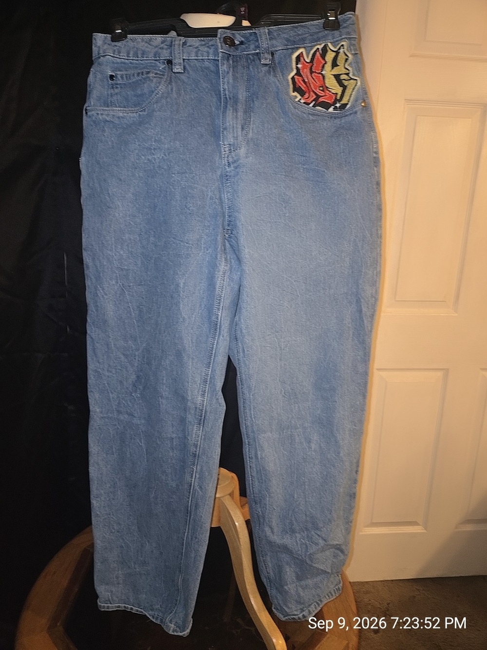 Light Blue Women's Denim Jeans with Embroidered Accent